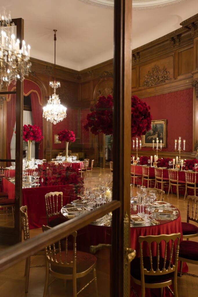 A luxurious wedding reception inside Perry Belmont House with dramatic architecture and opulent interiors