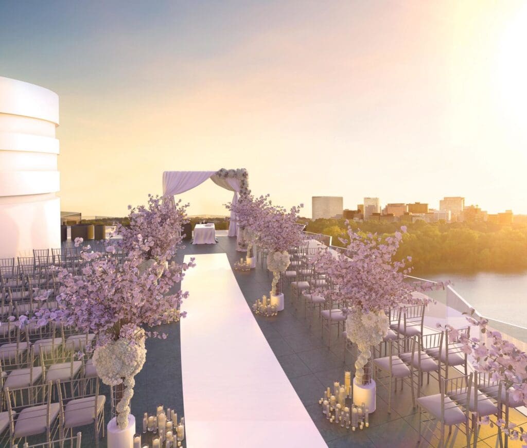 A modern wedding at The Watergate Hotel featuring rooftop views of the Potomac River