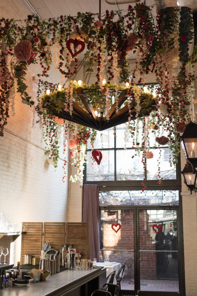 Romantic courtyard at Iron Gate restaurant wedding venue in Washington DC with lantern lighting