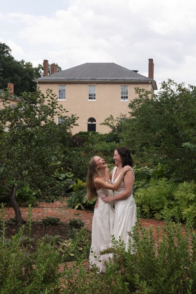 Couple walking through the gardens at Tudor Place during a Washington DC engagement session