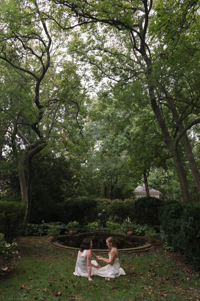 Couple walking through the gardens at Tudor Place during a Washington DC engagement session