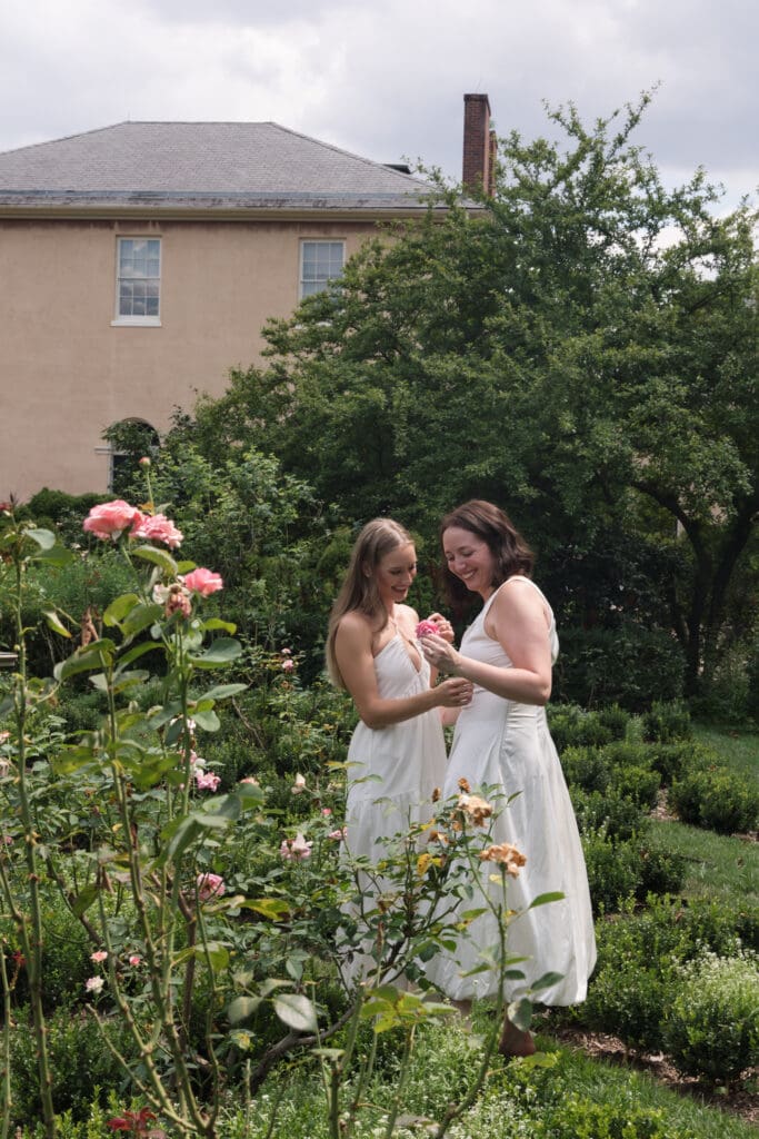 Couple walking through the gardens at Tudor Place during a Washington DC engagement session