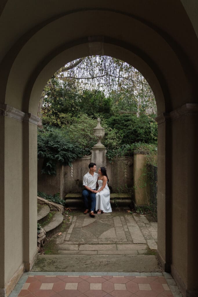 Engagement session at Dumbarton Oaks with ivy-covered pathways and stone staircases