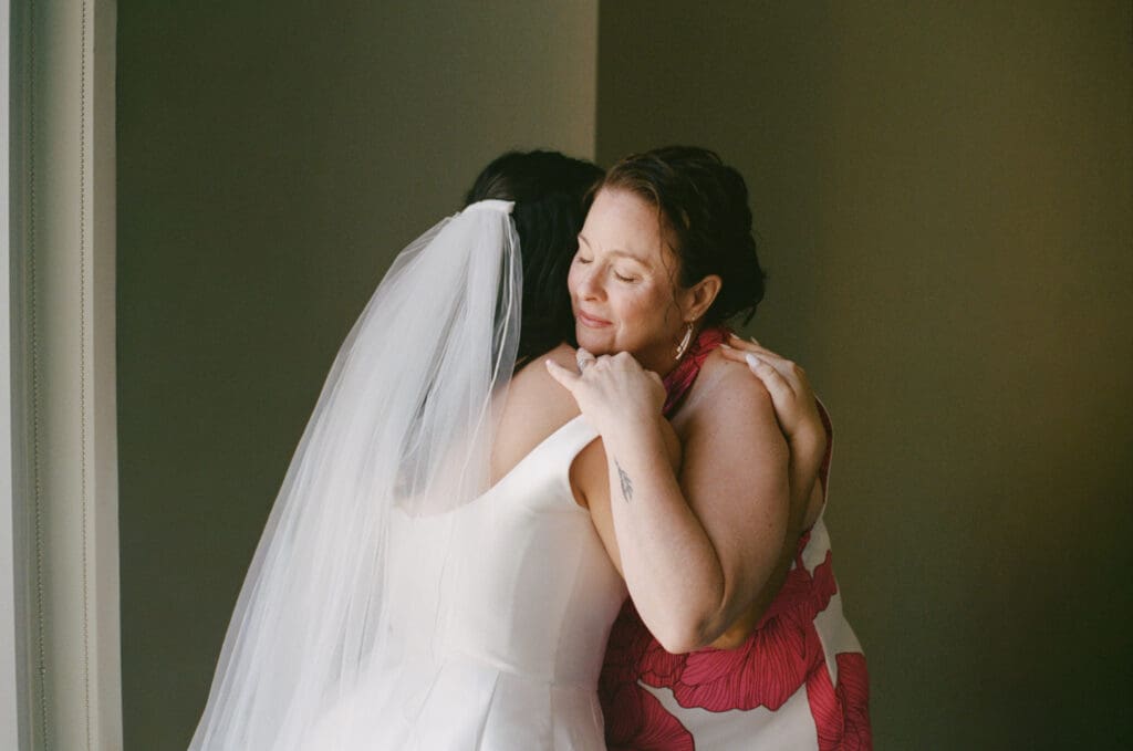 Emotional getting ready moments before intimate spring wedding in Washington DC