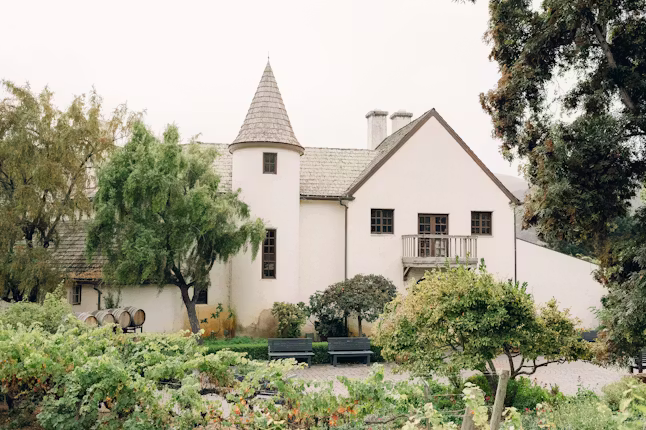 Vineyard wedding ceremony at Folktale Winery surrounded by rolling hills