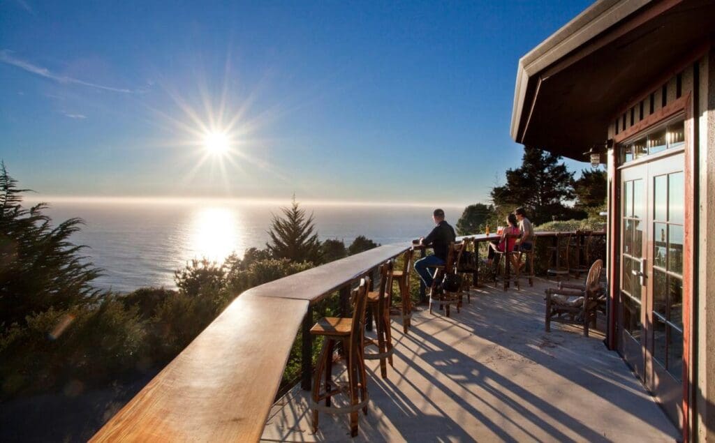 Ocean view dining deck at Treebones Resort overlooking Pacific coastline