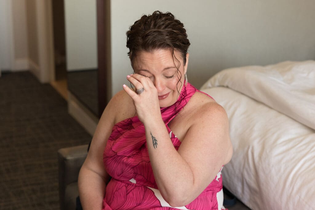 Emotional getting ready moments before intimate spring wedding in Washington DC