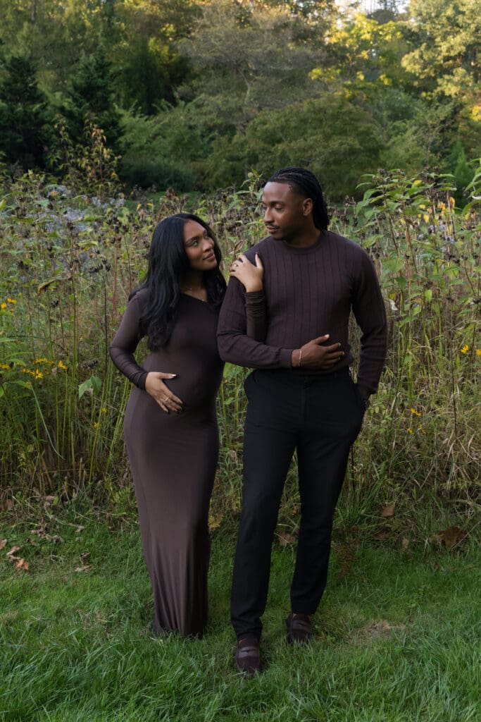 Couple holding hands in the flower gardens at Brookside Gardens