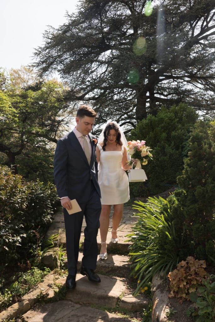 Couple exchanging private vows in the Bishop’s Garden at the Washington National Cathedral