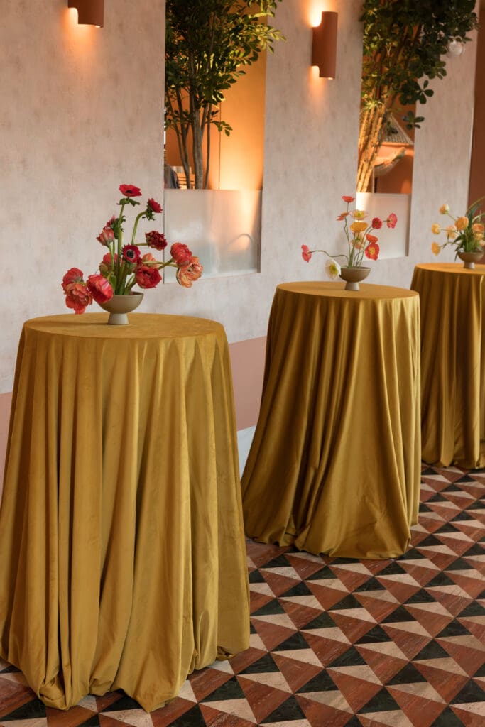 Colorful event design featuring pink and tangerine details at River Club DC in Washington, DC